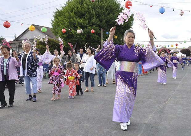 Dancer Karen Yoshi Tomi leads the flower dance during last year's Bon Odori Festival at the White River Buddhist Temple.