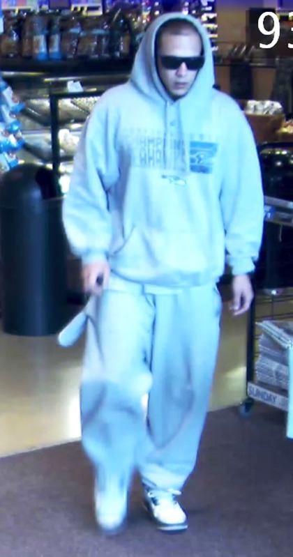 Police are looking for this man who robbed a credit union Tuesday morning.