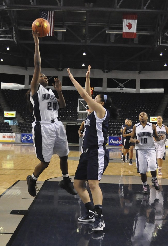 Auburn Riverside's Shantell jackson scores two of her 19 points against Bellarmine Prep.