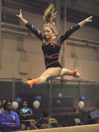 Auburn Mountainview's Natalie Hostetter performs on the beam.