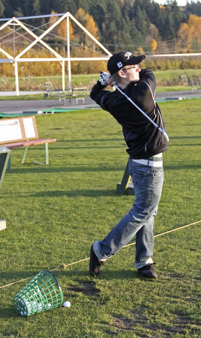 Nolan Cull on the driving range at Sumner Meadows.