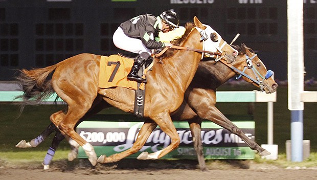 Lizzy Lass (inside) gets up in the final strides and edges Liberty Lake in the $13