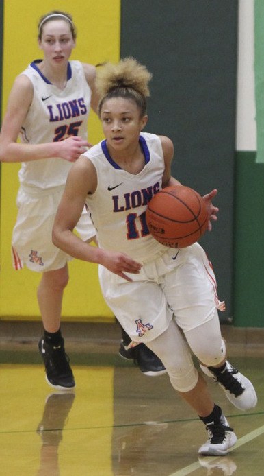 Auburn Mountainview senior guard Brianna Zaragoza-Jones scored a game-high 17 points in the Lions’ 57-52 overtime win Tuesday night against Peninsula in a loser-out district game at Clover Park High School.