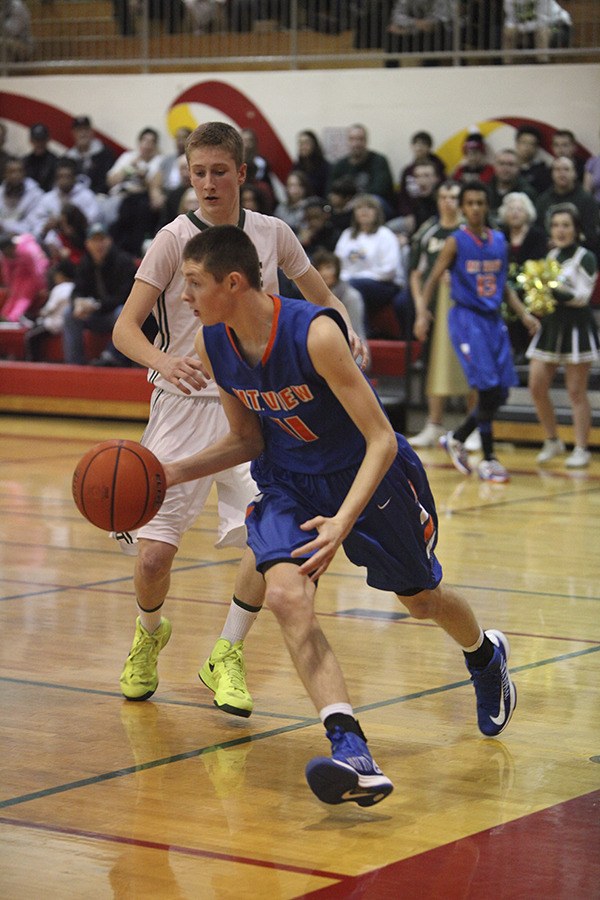 Auburn Mountainview's JJ Lacey in action on the hardwood this season.