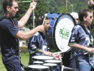 Members of the Seattle Seahawks’  Blue Thunder Drum Line perform in front of students and staff at Dick Scobee Elementary School last Friday – part of the school’s weeklong celebration of  the late Dick Scobee.  The school traditionally honors the life of the astronaut