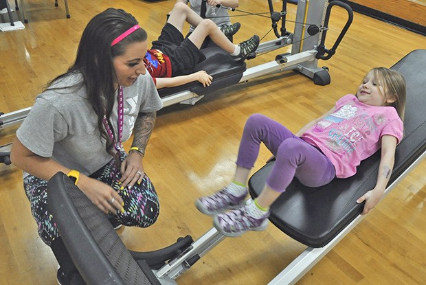 Trainer Sharee Akers supervises as Kallan Pairsh