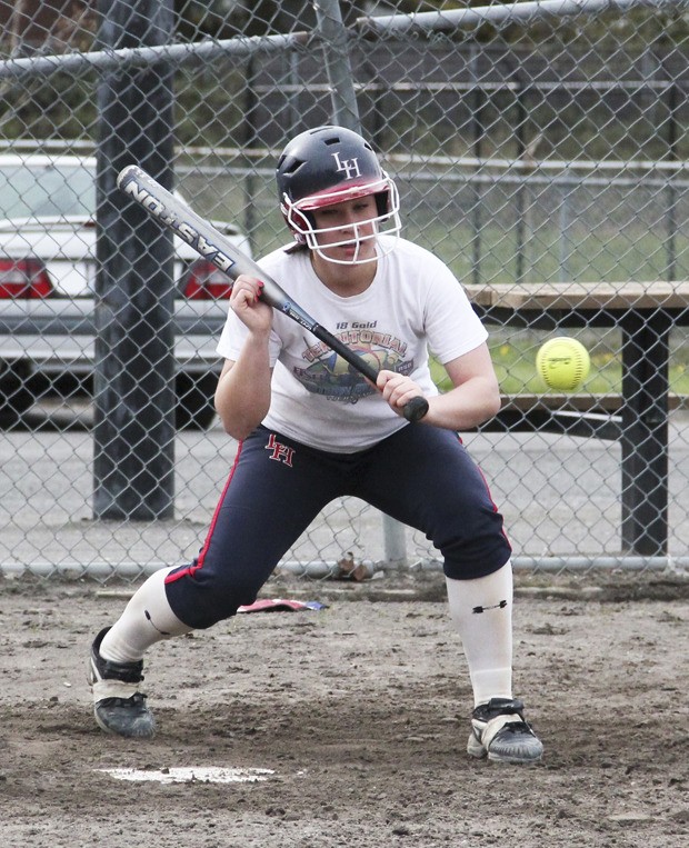 Auburn senior Amber Morrow will key the Trojan fastpitch squad's offense this season. Morrow already has eight home runs in seven games.