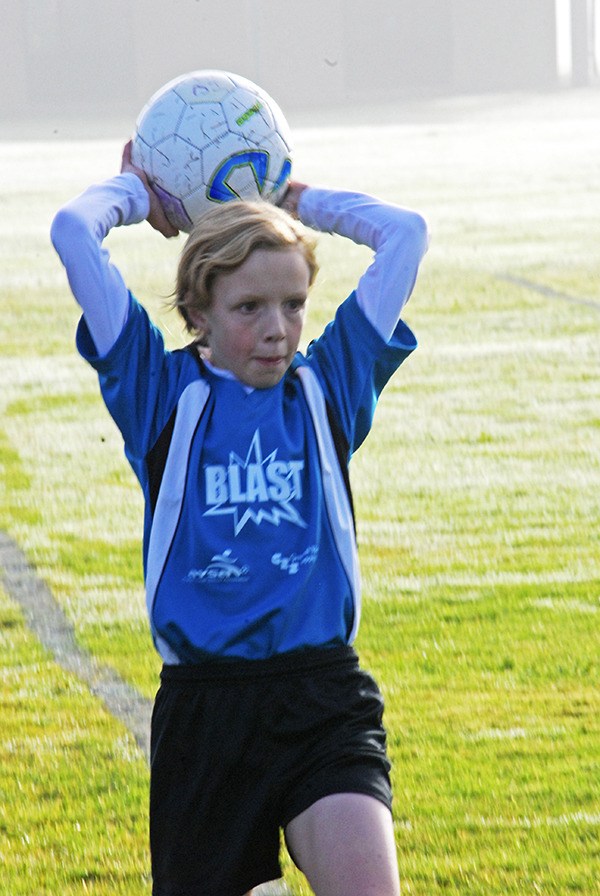 Dayna Kickner throws one in for the Auburn Youth Soccer Association Blasts U11.