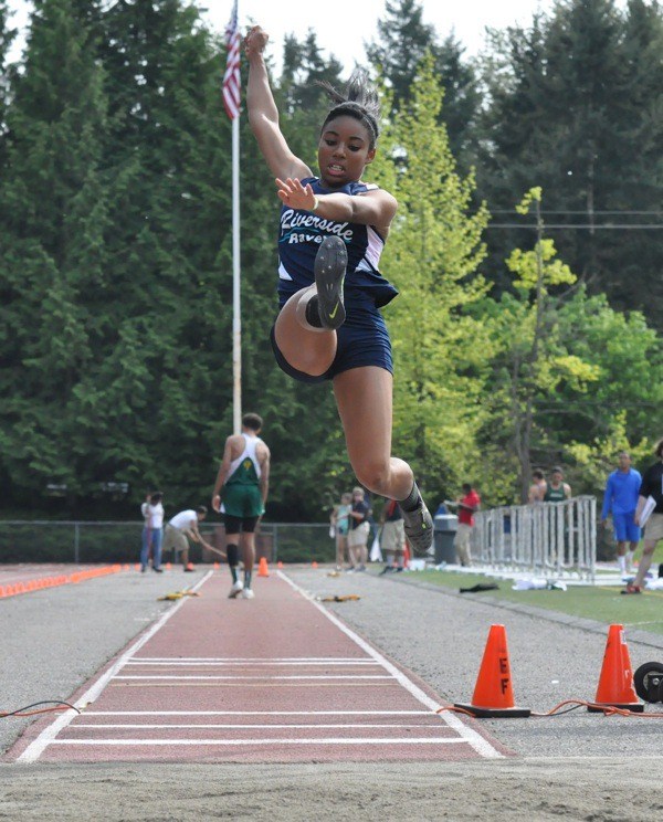 Auburn Riverside senior Brandi Williams competes in the long jump at this past weekend's South Puget Sound League 4A track and field meet at French Field in Kent.