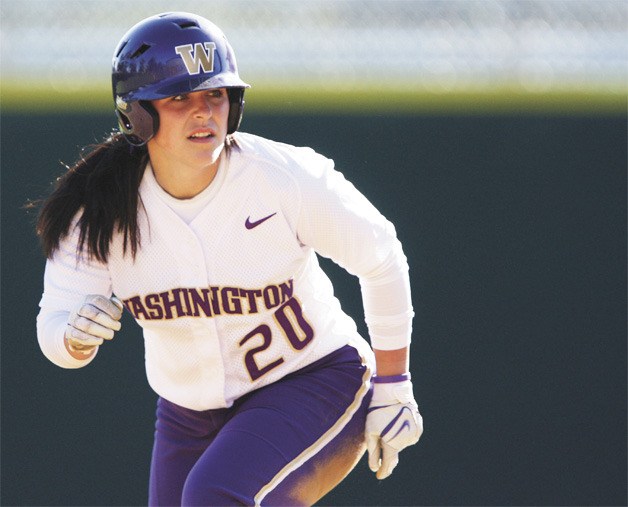 Auburn's Bailey Stenson in action with the UW fastpitch squad. Stenson wrote a blog-backed book about the Huskies' championship season.