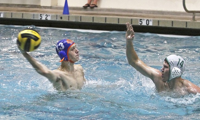 Auburn Mountainview's Stephen Creed fires one over Johnny Tyler from Emerald Ridge.