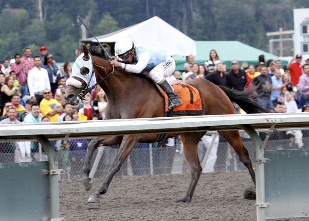 Stryker Phd sets a stakes record of 1:40.20 while winning the Mt. Rainier Handicap for 3-year-olds and up at Emerald Downs. Leslie Mawing rode the winner for trainer Larry Ross and owners Jim & Mona Hour.