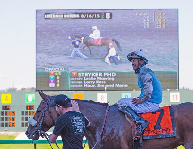 Jockey Leslie Mawing and 6-year-old gelding Stryker Phd win a second straight Longacres Mile and simultaneously appear on the track's new 1