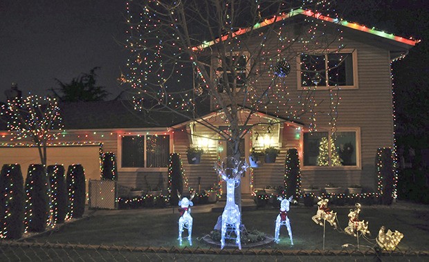 Ramon Lopez put in the extra effort and time to fully trim his north Auburn home with lights and reindeer in the true spirt of the Christmas season.