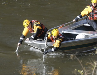 Members of the King County Sheriffs Marine Dive Unit searched last month for the missing car that carried two boys. The car eventually was found