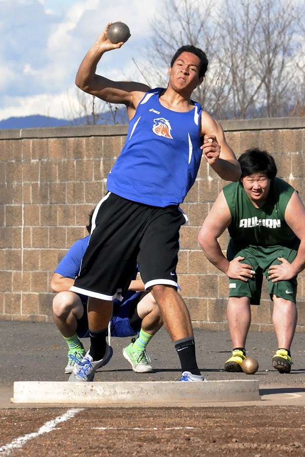 Auburn Mountainview's Trevor Jensen competes in the shot put earlier this year.