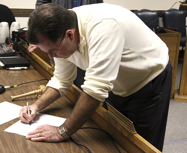 Pacific's new Finance Director Richard Gould sings on after Monday's city council meeting.