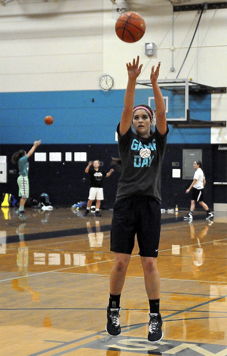 Auburn Riverside’s Kiana Drumheller uses her athleticism to give the Ravens a defensive presence in the post.