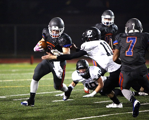 Joey Cassano slips by a Bonney Lake defender. Cassano was among nine Auburn Mountainview football players honored with all-SPSL 3A selections.