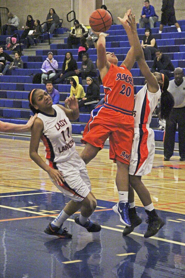 Auburn Mountainview senior Aalia Braboy drives against Lakes.