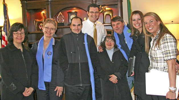 Sen. Joe Fain in his Olympia office with a group from Puget Sound Personnel