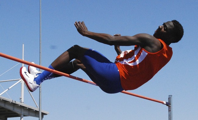 Auburn Mountainview's Shaddye Melu clears the bar in the high jump.