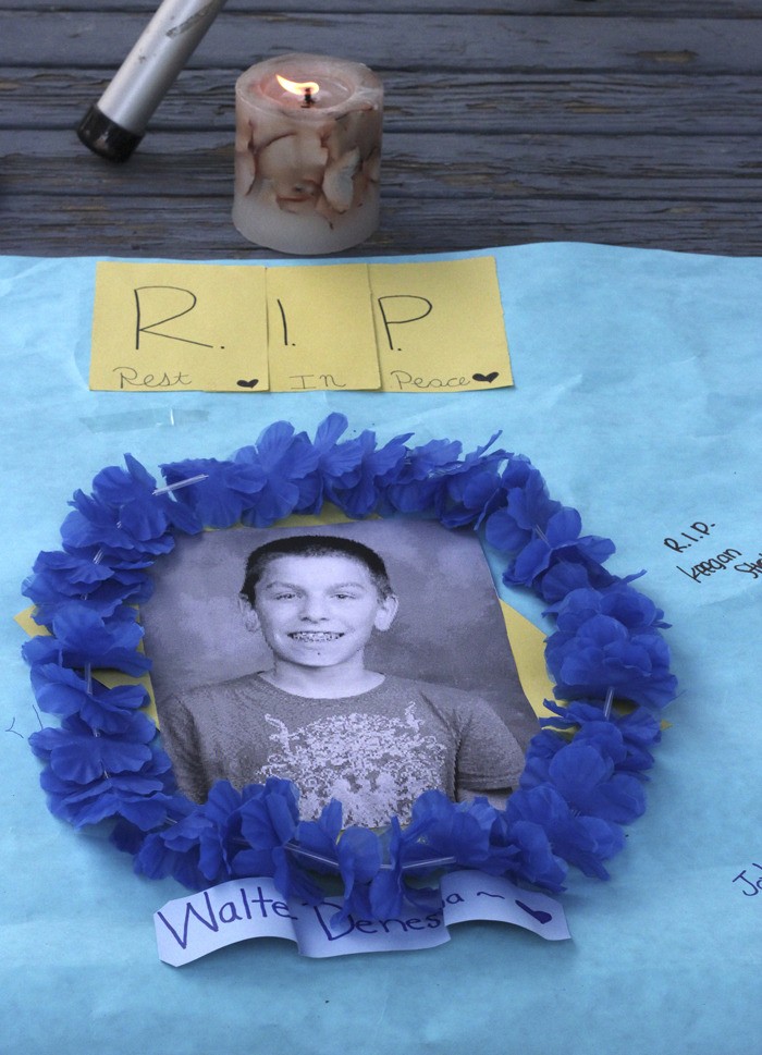 Friends and family gathered Friday at Pacific Park to remember slain Mt. Baker Middle School seventh-grader Walter Denesha.