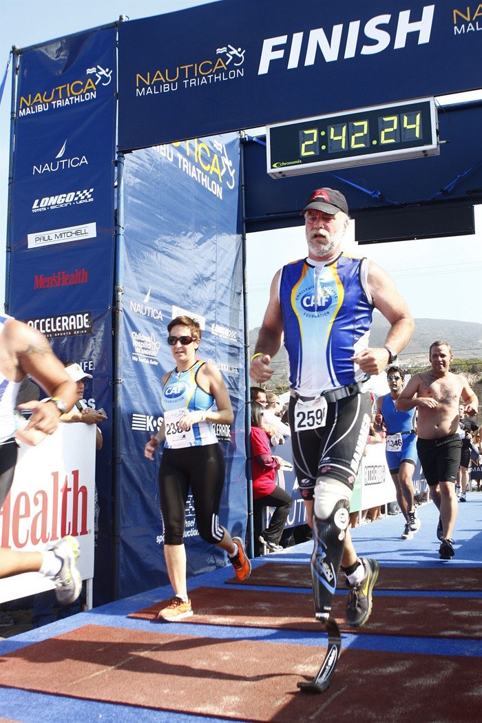 Auburn's Tony Smith finishes the Malibu Triathlon.