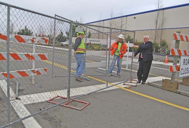 Auburn Mayor Pete Lewis officially opens the long-anticipated A-B corridor Thursday afternoon following approval by the state's Utilities and Transportation Commission of safety measures for a small railway spur that crosses the road.