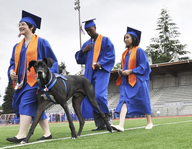 Tabbitha Schliesman walks with her service dog