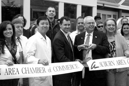 Mayor Pete Lewis and Auburn Area Chamber of Commerce members joined staff from Evergreen Eye Center to celebrate the grand opening of is new clinic.