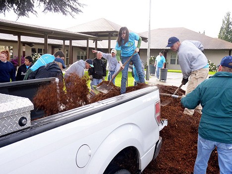 Volunteers did their part to beautify the grounds at Auburn High School.