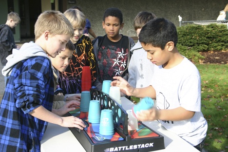 Evergreen Heights students participate in an attempt to break the Guinness World Record for speed stacking this past week. Pictured from left are