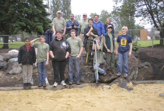 Boys Scout Troop 401 volunteered to help finish the Discovery Playground before its official grand opening on Friday.