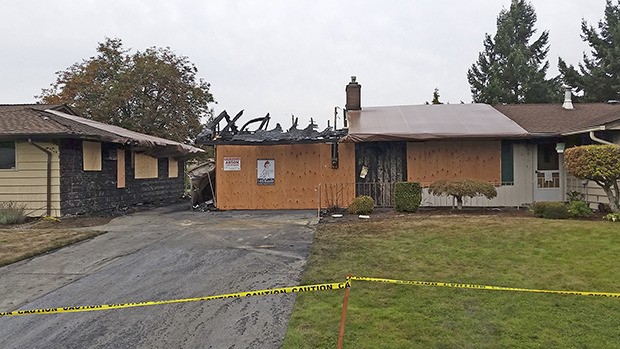 Fire heavily damaged a single-family home and an adjacent home in the 1300 block of G Street Southeast on Sunday night. The fire displaced three adults.