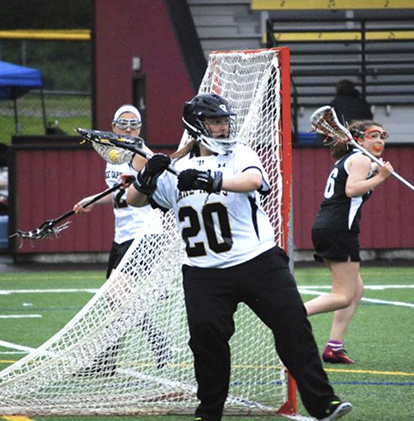 Nicole Burkhauser in goal for the Lake Tapps lacrosse club.