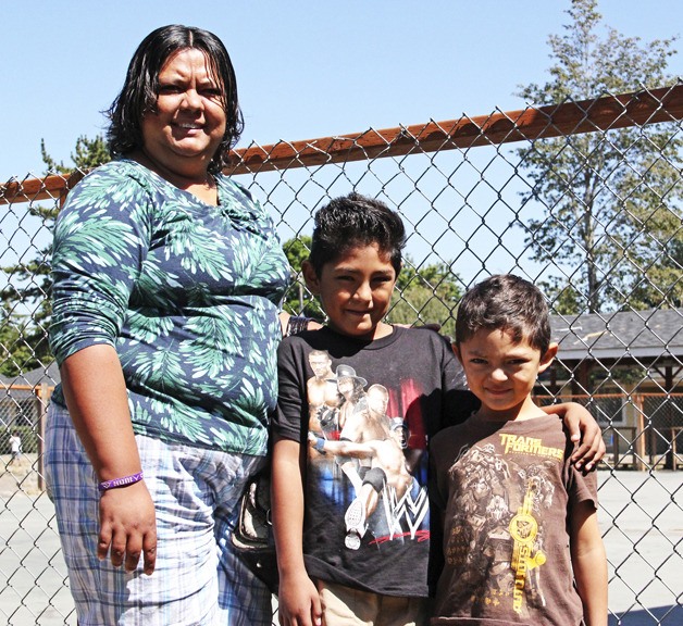 Yesenia Flores and her sons