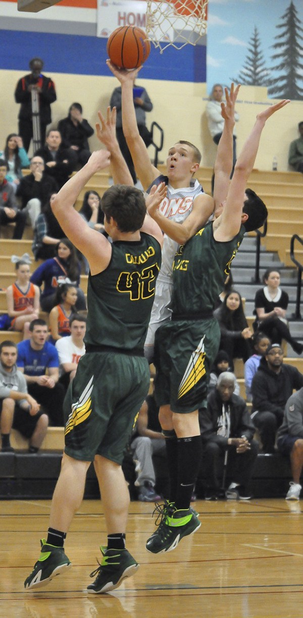 Auburn Mountainview junior Ryan Lacey puts one up against Peninsula.