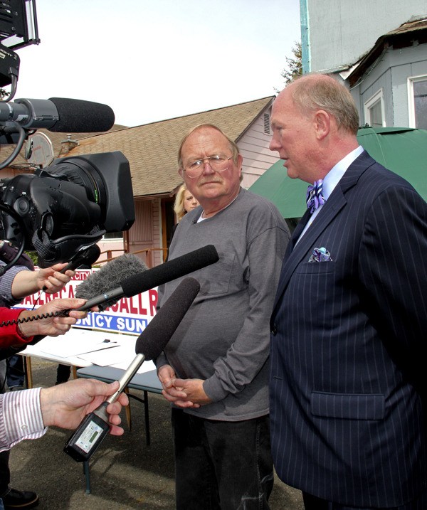 Committee to Recall Cy Sun Chairman Don Thomson and attorney Jeff Helsdon address the media.