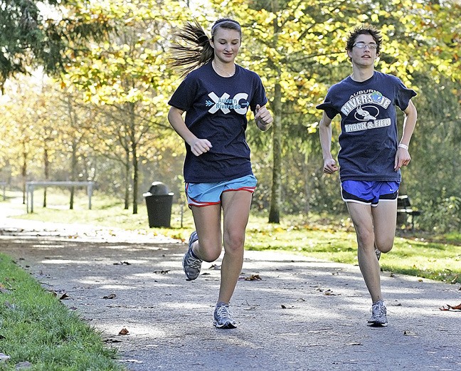 Auburn Riverside juniors Rachel Atwood and Korey Krotzer will represent the Ravens at the Washington State 4A Cross Country Championship meet this Saturday.