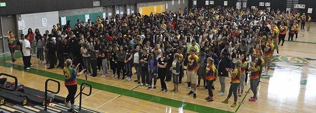 Troy Crew teacher Katie Henry talks to incoming freshman in the new Auburn High School gymnasium on Wednesday morning