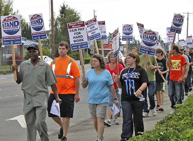 Members of three local grocery store workers’ unions picket Auburn’s Fred Meyer this past week. The picket lines at 38 Western Washington grocery stores were part of an informational event by the unions