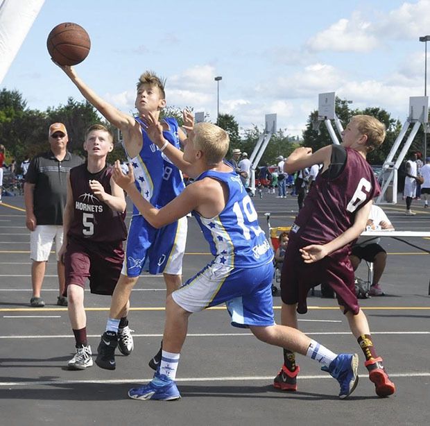 Cal Sample goes up for a shot during last year's EmD3-On-3.