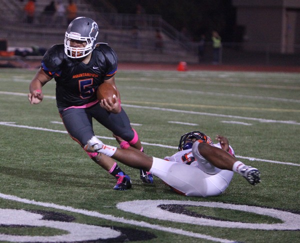 Running back Bitner Wilson escapes a Lakes defender.