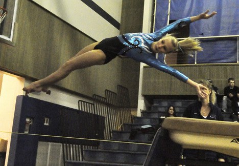 Raven Rachel Turnbow vaults at a competition earlier this season.