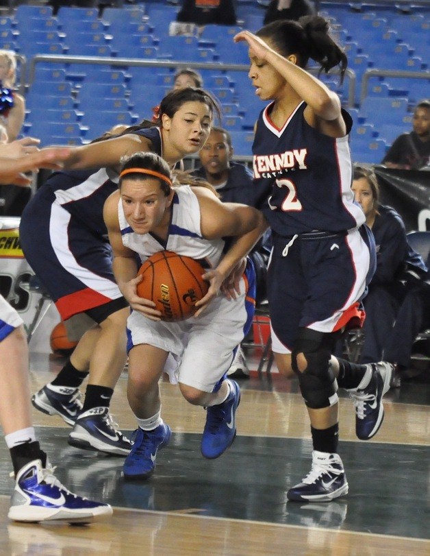 Auburn Mountainview's Erika Lombardo tries to escape the tight defense applied by Kennedy Catholic's Alli Madison