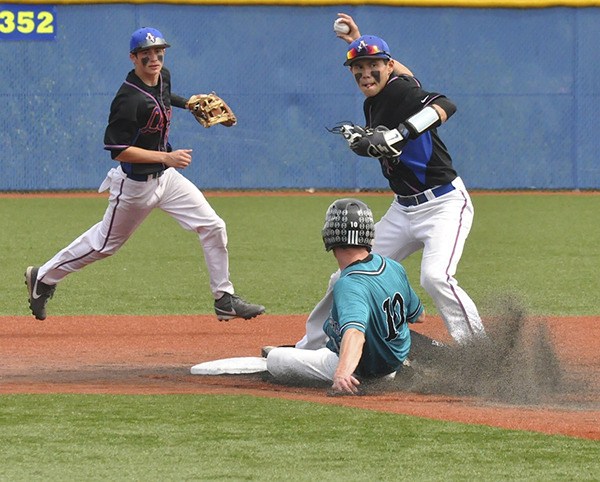 Lion second baseman Matt Anderson gets the force on Bonney Lake's Michael Gretler.  Also in photo is Auburn Mountainview's Tyler Friis.