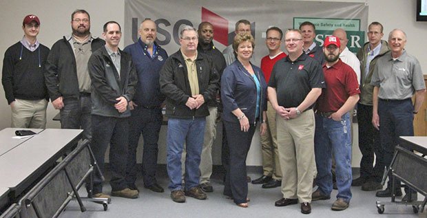 Mayor Nancy Backus joined USG employees and managers at the Auburn plant Wednesday. The company donated $25