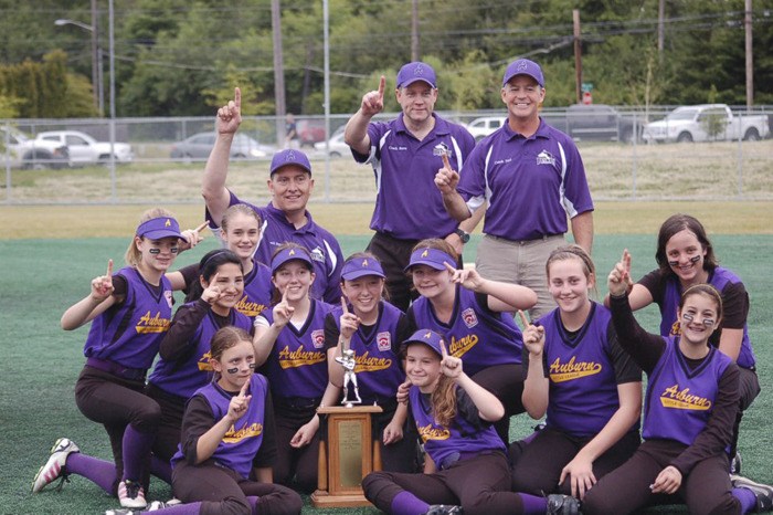 The Auburn Little League Lady Huskies fastpitch team