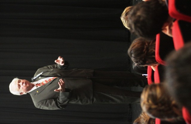 Mayor Pete Lewis addresses the Up with People cast at the Auburn Avenue Theater.